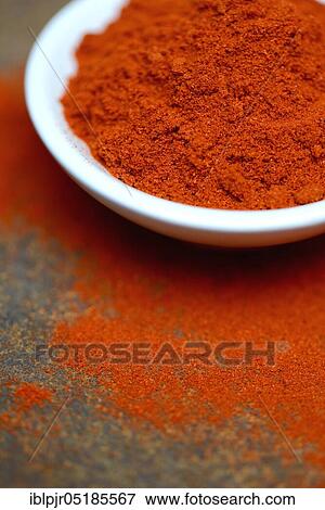 Stock Photo - Paprika powder in shell( Capsicum annuum), chili, chili powder. Fotosearch