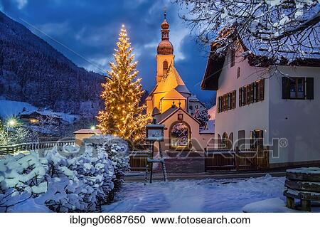 Stock Image - Parish church with Christmas fir tree, Ramsau, Berchtesgadener Land, Upper Bavaria, Bavaria, Germany, Europe. Fotosearch