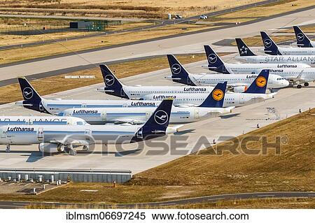 Parked Lufthansa aircraft Coronavirus Corona Virus COVID-19 Airport Berlin Brandenburg BER aerial photo in Berlin, Germany, Europe View Large Photo Image Stock Photography - Parked Lufthansa aircraft Coronavirus Corona Virus COVID-19 Airport Berlin Brandenburg BER aerial photo in Berlin, Germany, Europe. Fotosearch