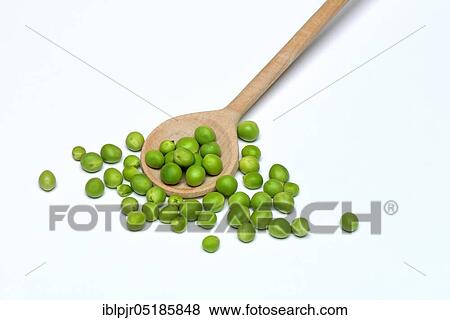 Stock Photo - Peas ( Pisum sativum), green with cooking spoon. Fotosearch