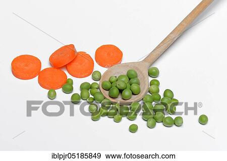 Peas ( Pisum sativum), green with cooking spoon View Large Photo Image Stock Photo - Peas ( Pisum sativum), green with cooking spoon. Fotosearch