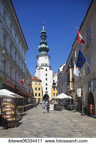 Stock Image - Pedestrian zone with restaurants in Michalska Street with Michael's Gate, Old Town, Bratislava, Slovakia, Europe. Fotosearch