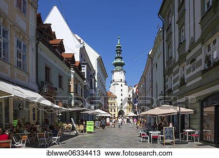 Pedestrian zone with restaurants in Michalska Street with Michael's Gate, Old Town, Bratislava, Slovakia, Europe View Large Photo Image Stock Image - Pedestrian zone with restaurants in Michalska Street with Michael's Gate, Old Town, Bratislava, Slovakia, Europe. Fotosearch