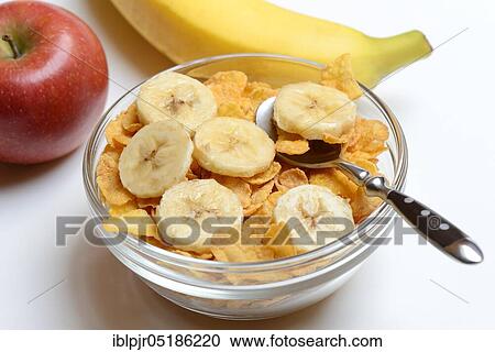 Peel with cornflakes and banana slices, banana, apple View Large Photo Image Stock Image - Peel with cornflakes and banana slices, banana, apple. Fotosearch