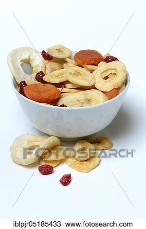 Peel with dried fruit, apple ring, apple rings, banana slices, cranberries, banana chips View Large Photo Image Stock Image - Peel with dried fruit, apple ring, apple rings, banana slices, cranberries, banana chips. Fotosearch