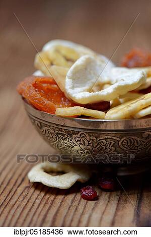 Peel with dried fruit, apple ring, apple rings, banana slices, cranberries, banana chips View Large Photo Image Stock Photograph - Peel with dried fruit, apple ring, apple rings, banana slices, cranberries, banana chips. Fotosearch