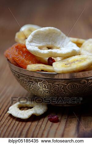 Peel with dried fruit, apple ring, apple rings, banana slices, cranberries, banana chips View Large Photo Image Stock Photography - Peel with dried fruit, apple ring, apple rings, banana slices, cranberries, banana chips. Fotosearch