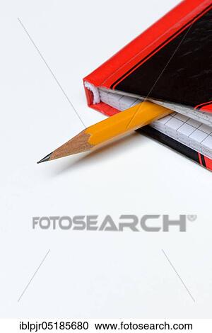 Stock Image - Pencil and notebook. Fotosearch