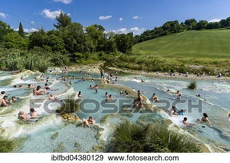 People are bathing in the hot springs of Saturnia Therme, Saturnia, Tuscany, Italy, Europe View Large Photo Image Stock Photo - People are bathing in the hot springs of Saturnia Therme, Saturnia, Tuscany, Italy, Europe. Fotosearch