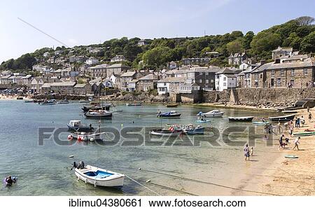 People on beach, Mousehole village, Cornwall, England View Large Photo Image Stock Image - People on beach, Mousehole village, Cornwall, England. Fotosearch