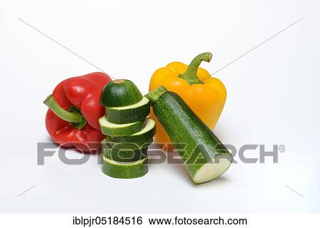 Peppers and courgettes ( Cucurbita pepo var. giromontiina) ( Capsicum annuum) View Large Photo Image Stock Photograph - Peppers and courgettes ( Cucurbita pepo var. giromontiina) ( Capsicum annuum). Fotosearch