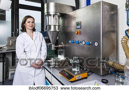 PhD student during her research work on a Hüttlin-Mycrolab machine (fluid bed granulator) at the Institute of Pharmaceutical Technology and Biopharmacy at Heinrich-Heine-University Düsseldorf, North Rhine-Westphalia, Germany, Europe View Large Photo Image Stock Image - PhD student during her research work on a Hüttlin-Mycrolab machine (fluid bed granulator) at the Institute of Pharmaceutical Technology and Biopharmacy at Heinrich-Heine-University Düsseldorf, North Rhine-Westphalia, Germany, Europe. Fotosearch