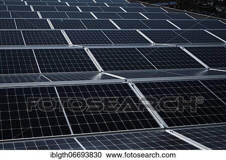 Photovoltaic system, rooftop installation, solar modules on the roof of a commercial enterprise, stand, Friedberg, Hesse, Germany, Europe View Large Photo Image Stock Image - Photovoltaic system, rooftop installation, solar modules on the roof of a commercial enterprise, stand, Friedberg, Hesse, Germany, Europe. Fotosearch