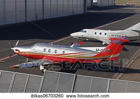 Stock Image - Pilatus PC-12/47E single-engine turboprop business jet at the Jet Aviation Executive Terminal, Düsseldorf Airport, North Rhine-Westphalia, Germany, Europe. Fotosearch