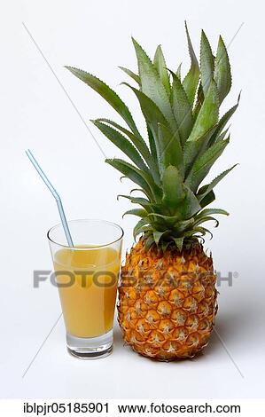 Pineapplejuice and ( Ananas comosus) View Large Photo Image Stock Image - Pineapplejuice and ( Ananas comosus). Fotosearch