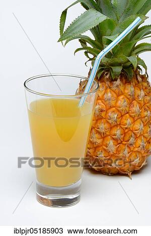 Pineapplejuice and ( Ananas comosus) View Large Photo Image Stock Image - Pineapplejuice and ( Ananas comosus). Fotosearch