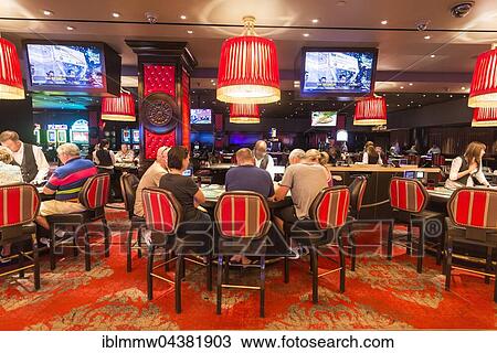 Poker players at poker table in casino, Las Vegas, Nevada, USA, North America View Large Photo Image Stock Image - Poker players at poker table in casino, Las Vegas, Nevada, USA, North America. Fotosearch