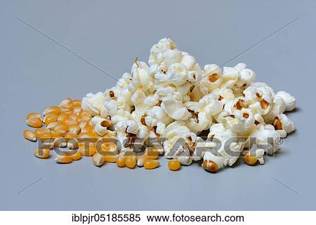 Stock Photography - Popcorn and corn kernels. Fotosearch