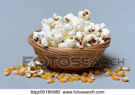 Popcorn in baskets and corn kernels View Large Photo Image Stock Image - Popcorn in baskets and corn kernels. Fotosearch