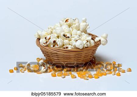 Popcorn in baskets and corn kernels View Large Photo Image Stock Photo - Popcorn in baskets and corn kernels. Fotosearch