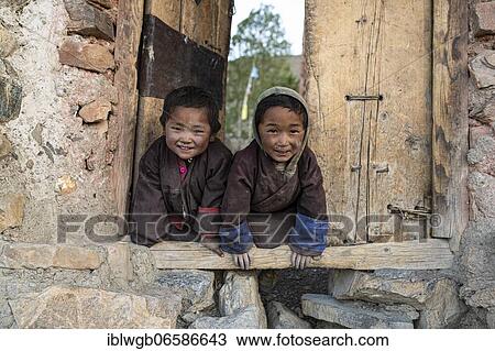 Portrait, children in front of a wooden door, Saldang, Dolpo, Nepal, Asia View Large Photo Image Stock Image - Portrait, children in front of a wooden door, Saldang, Dolpo, Nepal, Asia. Fotosearch
