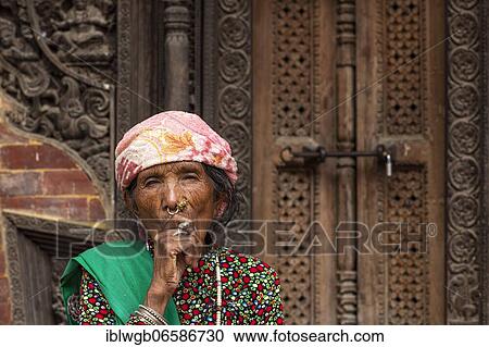 Portrait, elderly woman smoking, Kathmandu, Nepal, Asia View Large Photo Image Stock Image - Portrait, elderly woman smoking, Kathmandu, Nepal, Asia. Fotosearch
