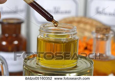 Production Calendula ointment (Calendula officinalis), calendula ointment, propolis View Large Photo Image Stock Image - Production Calendula ointment (Calendula officinalis), calendula ointment, propolis. Fotosearch