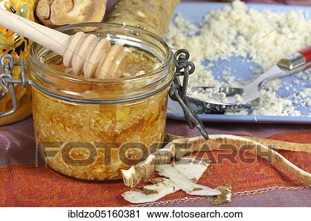 Production horseradish syrup (Cochlearia armoracia) with honey, horseradish View Large Photo Image Stock Image - Production horseradish syrup (Cochlearia armoracia) with honey, horseradish. Fotosearch