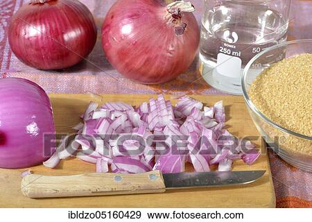 Production of onion syrup with brown sugar View Large Photo Image Stock Photo - Production of onion syrup with brown sugar. Fotosearch