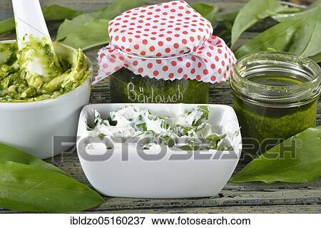 Stock Photo - Production of wild garlic butter (Allium ursinum), wild garlic butter, wild garlic pesto, wild garlic quark. Fotosearch