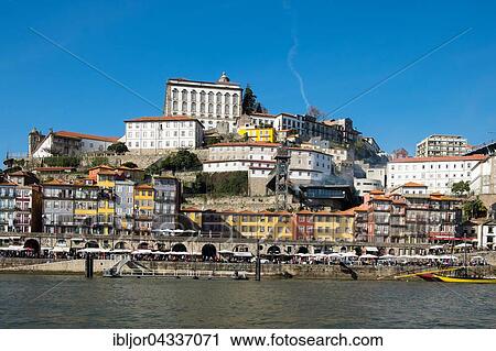 Stock Image - Promenade, Ribeira historic centre, Episcopal Palace, former bishops' residence, Porto, UNESCO World Heritage Site, Portugal, Europe. Fotosearch