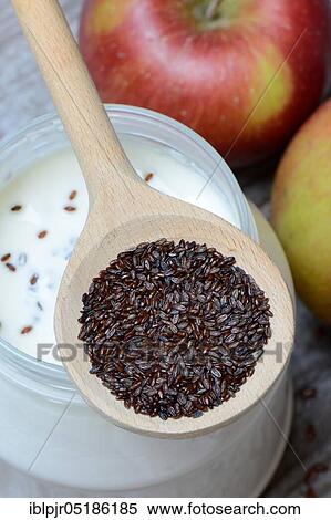 Psyllium plantain in cooking spoon on yoghurt glass and apples ( Plantago psyllium) View Large Photo Image Stock Photography - Psyllium plantain in cooking spoon on yoghurt glass and apples ( Plantago psyllium). Fotosearch