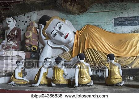 Reclining Buddha at Kaw-goon Cave Temple, Mon State, Myanmar, Asia View Large Photo Image Stock Photograph - Reclining Buddha at Kaw-goon Cave Temple, Mon State, Myanmar, Asia. Fotosearch