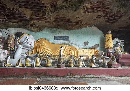 Stock Photography - Reclining Buddha at Kaw-goon Cave Temple, Mon State, Myanmar, Asia. Fotosearch