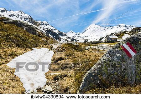 Red and white sign painted on rock marking hiking trail, hut in background, mountains, Rohrmoos-Untertal, Schladming Tauern, Schladming, Styria, Austria, Europe View Large Photo Image Picture - Red and white sign painted on rock marking hiking trail, hut in background, mountains, Rohrmoos-Untertal, Schladming Tauern, Schladming, Styria, Austria, Europe. Fotosearch