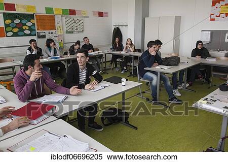Refugee class in the Training Preparation International (AVI) of the Elly-Heuss-Knapp-Schule, a vocational college of the city of Düsseldorf, North Rhine-Westphalia, Germany, Europe View Large Photo Image Stock Photography - Refugee class in the Training Preparation International (AVI) of the Elly-Heuss-Knapp-Schule, a vocational college of the city of Düsseldorf, North Rhine-Westphalia, Germany, Europe. Fotosearch