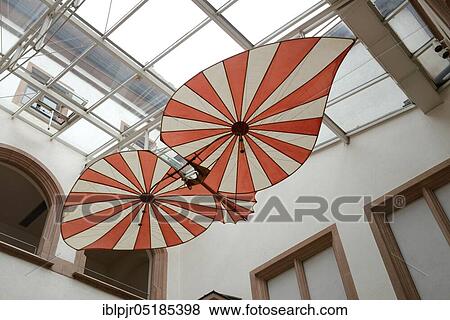 Stock Photo - Replica of the hang glider by Albrecht Ludwig Berblinger, atrium of the Ulm city hall, Schneider von Ulm, model, aviation pioneer, flight pioneer, flying kite, Ulm, Baden-Württemberg, Germany, Europe. Fotosearch