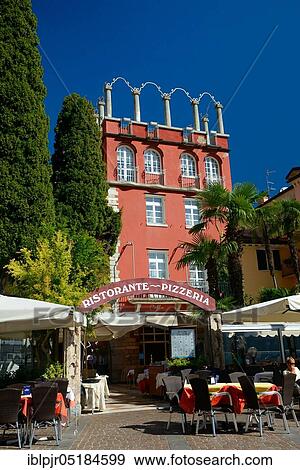 Stock Photo - Restaurant, Riva del Garda, Lake Garda, Trentino, Province of Trento, Italy, Europe. Fotosearch