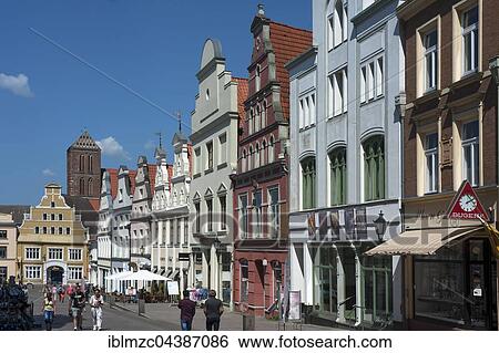 Restored, colorful facades of houses in the pedestrian area, behind St. Nikolai, Wismar, Mecklenburg-Western Pomerania, Germany, Europe View Large Photo Image Stock Photograph - Restored, colorful facades of houses in the pedestrian area, behind St. Nikolai, Wismar, Mecklenburg-Western Pomerania, Germany, Europe. Fotosearch