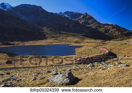 Rhaetian Railway on the Bernina Pass, Lago Bianco, Lej Nair, Graubuenden, Switzerland, Europe View Large Photo Image Stock Photo - Rhaetian Railway on the Bernina Pass, Lago Bianco, Lej Nair, Graubuenden, Switzerland, Europe. Fotosearch