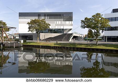 Rhine-Waal University of Applied Sciences, central lecture hall building, Audimax, Kleve campus on a former harbour site on the Spoykanal, Kleve, Lower Rhine, North Rhine-Westphalia, Germany, Europe View Large Photo Image Stock Photo - Rhine-Waal University of Applied Sciences, central lecture hall building, Audimax, Kleve campus on a former harbour site on the Spoykanal, Kleve, Lower Rhine, North Rhine-Westphalia, Germany, Europe. Fotosearch