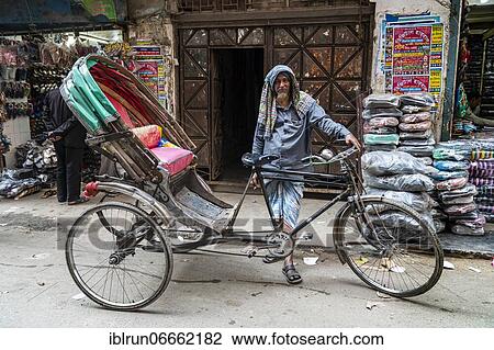 Rickshaw drivers in the bazaar, Dhaka, Bangladesh, Asia View Large Photo Image Stock Image - Rickshaw drivers in the bazaar, Dhaka, Bangladesh, Asia. Fotosearch