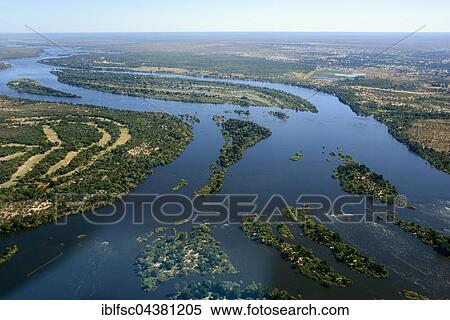 River landscape, Zambezi, islets, Zambia, Africa View Large Photo Image Stock Photography - River landscape, Zambezi, islets, Zambia, Africa. Fotosearch