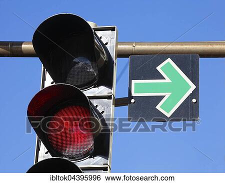 Road sign, green arrow and red traffic light, Germany, Europe View Large Photo Image Stock Photograph - Road sign, green arrow and red traffic light, Germany, Europe. Fotosearch