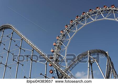 Roller coaster and Ferris wheel, Tokyo Dome City Attraction, amusement park, Tokyo, Japan, Asia View Large Photo Image Stock Photo - Roller coaster and Ferris wheel, Tokyo Dome City Attraction, amusement park, Tokyo, Japan, Asia. Fotosearch