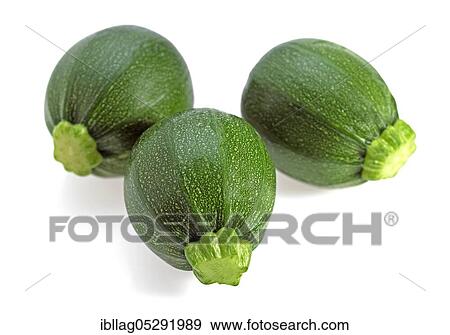 Round zucchini or courgettes (cucurbita pepo) against a white background View Large Photo Image Stock Photo - Round zucchini or courgettes (cucurbita pepo) against a white background. Fotosearch