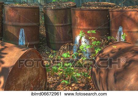Rusted barrels, Lost Place, Chernobyl exclusion zone, Ukraine, Europe View Large Photo Image Stock Image - Rusted barrels, Lost Place, Chernobyl exclusion zone, Ukraine, Europe. Fotosearch