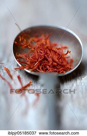Saffron threads in spoon, saffron thread View Large Photo Image Stock Photo - Saffron threads in spoon, saffron thread. Fotosearch