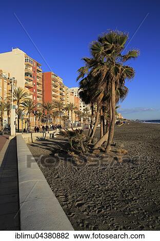 Stock Image - Sandy beach and seafront apartments, Almería, Andalusia, Spain, Europe. Fotosearch