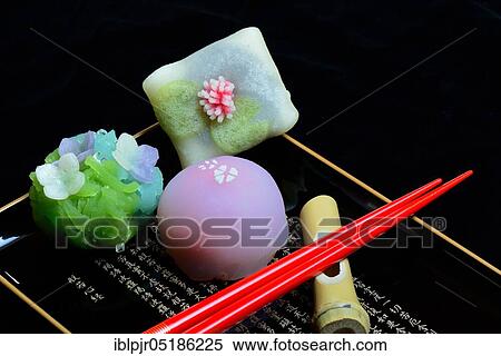 shi, Japanese sweets on tray with characters and chopsticks View Large Photo Image Stock Photography - shi, Japanese sweets on tray with characters and chopsticks. Fotosearch